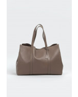 Large taupe colour tote bag made of leather.